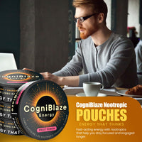 Man working at a desk with CogniBlaze Nootropic Pouches displayed in front of him.
