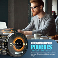Man sitting at a desk with CogniBlaze nootropic pouches displayed.